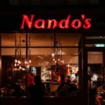 Solicitor who posed as police officer to spy on ex-partner at Nando’s handed community order